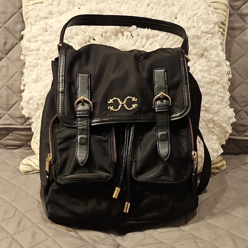C. Wonder Black  Backpack with Glossy Finish and Gold Hardware